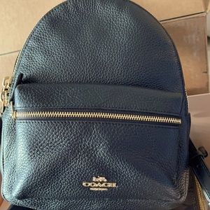 Black coach mini backpack